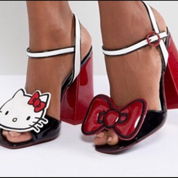 Shoes - NEW/NEVER WORN HELLO KITTY HIGH HEEL SANDALS 10M